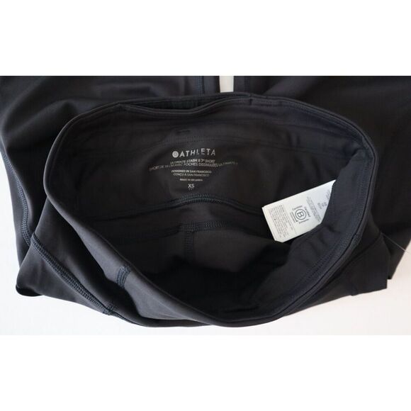 Athleta 987266-00 Women's Sz XS Black Salutation Stash High Rise 7" Shorts - Picture 3 of 14